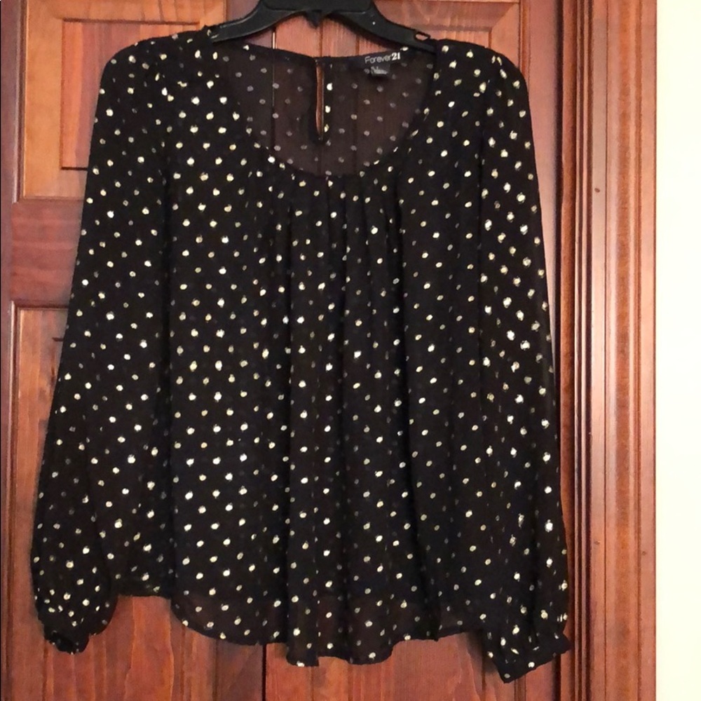Women’s black and silver long sleeve blouse